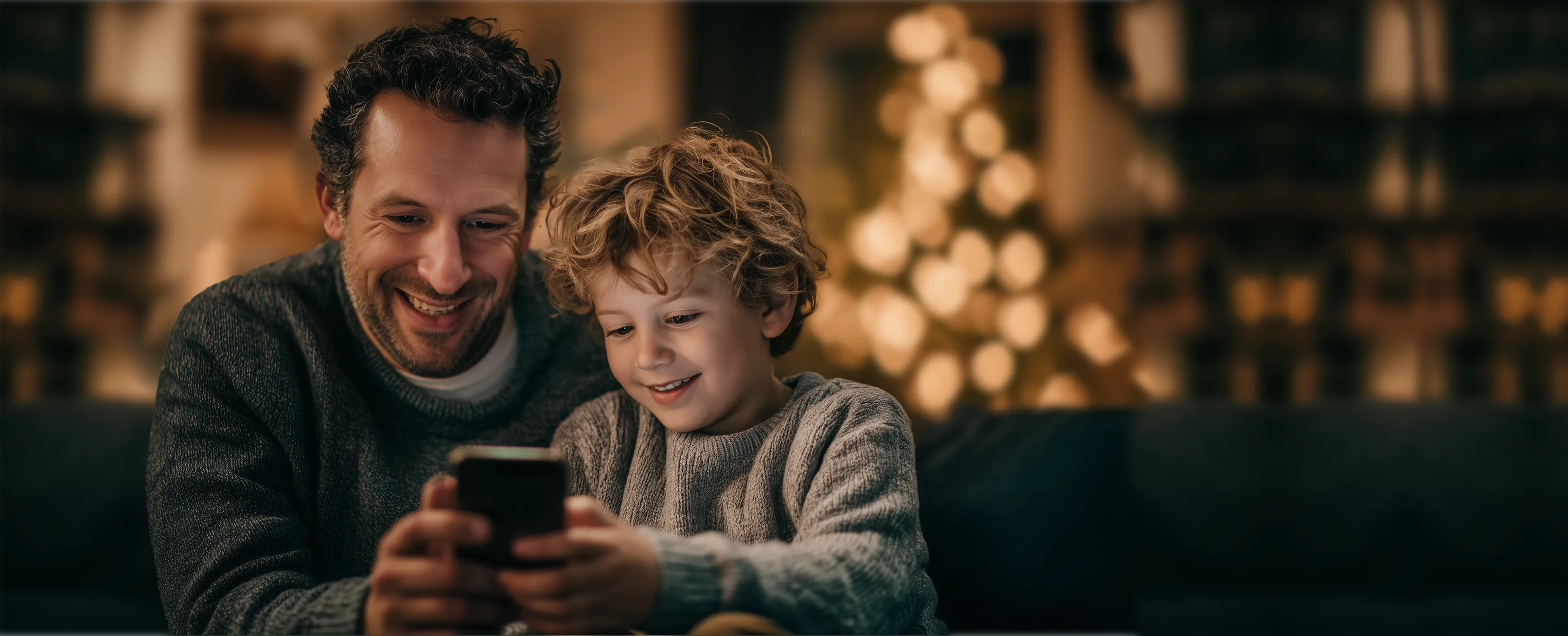 Father and kids checking chores in an app for family chores